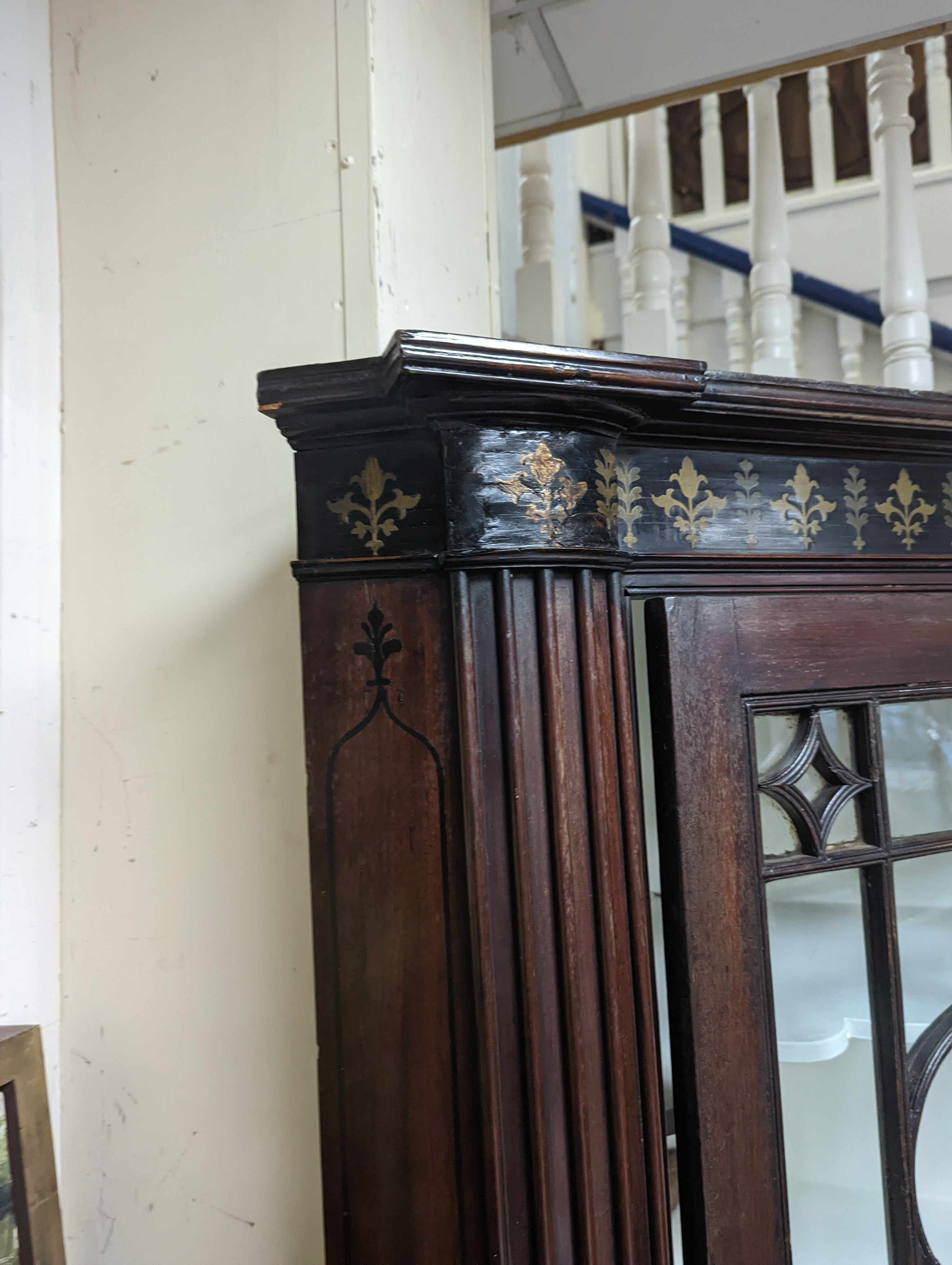 A Regency brass inlaid banded mahogany standing corner cabinet, width 96cm, depth 50cm, height 212cm